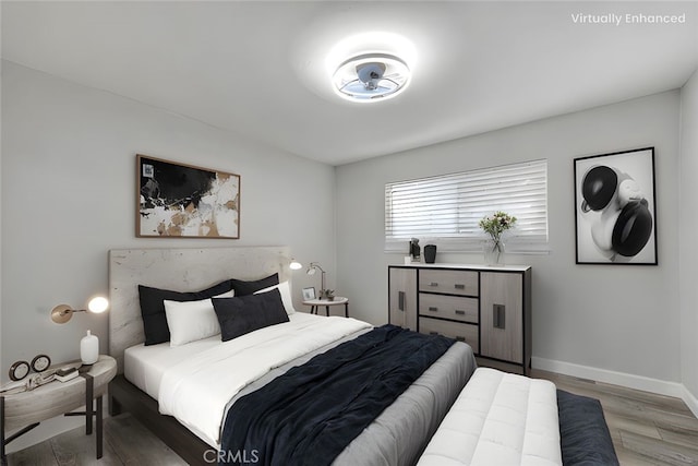 7747 Onyx Ave, Rancho Cucamonga, CA 91730 - bedroom with light wood finished floors and baseboards