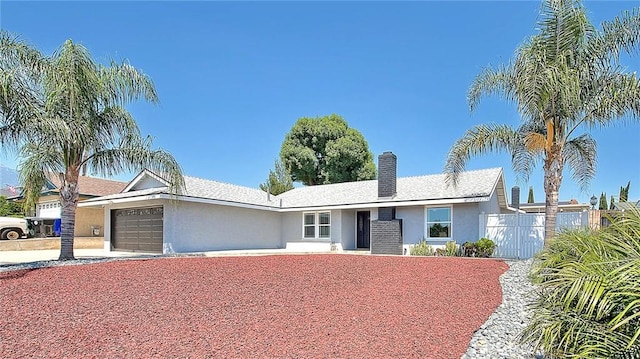 7747 Onyx Ave, Rancho Cucamonga, CA 91730 - ranch-style home with an attached garage, stucco siding, and driveway