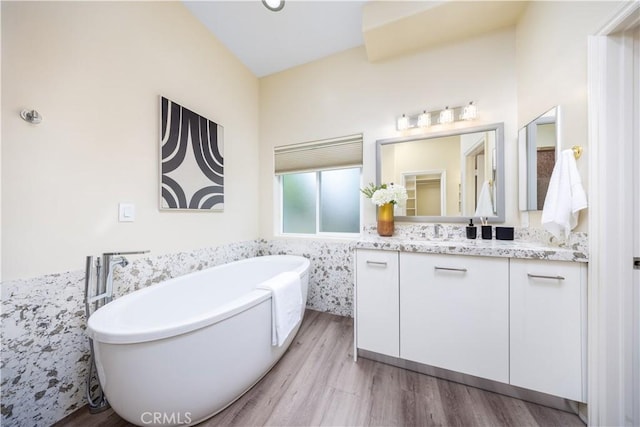 2122 Meteora Way, Rowland Heights, CA 91748 - bathroom with vanity, a freestanding bath, and wood finished floors