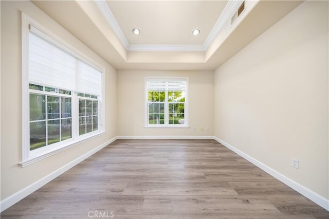2122 Meteora Way, Rowland Heights, CA 91748 - empty room with crown molding, a tray ceiling, recessed lighting, baseboards, and wood finished floors