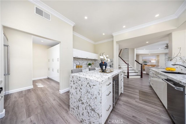2122 Meteora Way, Rowland Heights, CA 91748 - kitchen featuring dishwasher, a sink, modern cabinets, white cabinetry, and tasteful backsplash