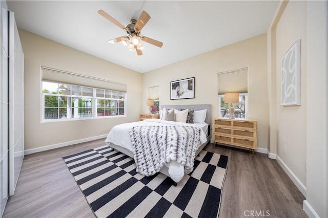 2122 Meteora Way, Rowland Heights, CA 91748 - bedroom with wood finished floors, baseboards, and ceiling fan