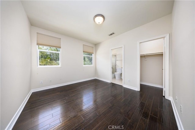 2122 Meteora Way, Rowland Heights, CA 91748 - unfurnished bedroom with dark wood-style floors, baseboards, and a closet