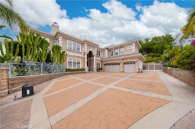 2122 Meteora Way, Rowland Heights, CA 91748 - view of front facade with driveway, a garage, and a chimney