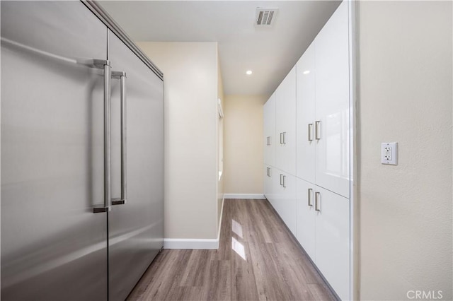2122 Meteora Way, Rowland Heights, CA 91748 - spacious closet with light wood-style flooring