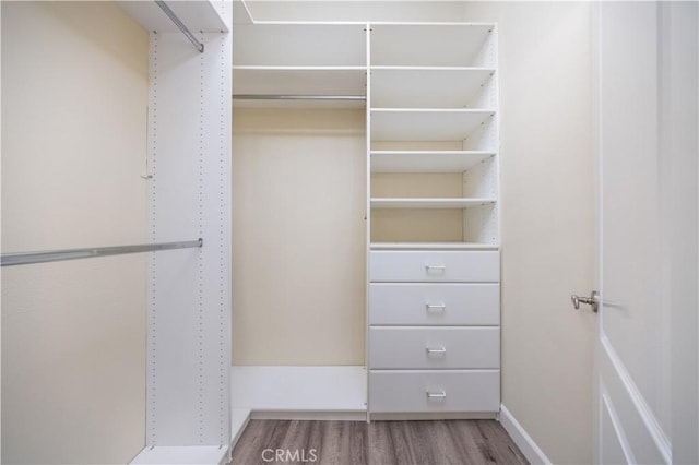 2122 Meteora Way, Rowland Heights, CA 91748 - spacious closet with wood finished floors