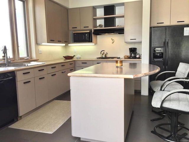 2207 Hoberg Rd, Borrego Springs, CA 92004 - kitchen featuring black appliances, light countertops, open shelves, and a center island