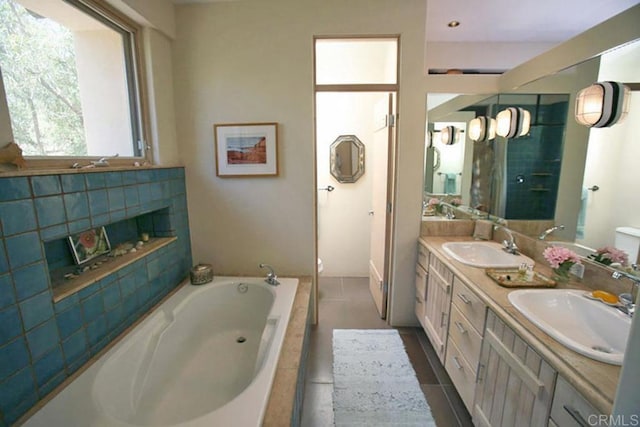 2207 Hoberg Rd, Borrego Springs, CA 92004 - bathroom with double vanity, a garden tub, a fireplace, tile patterned floors, and a shower