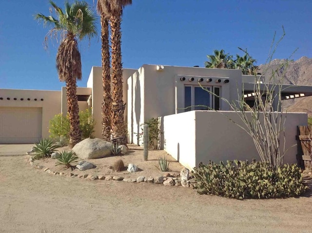 2207 Hoberg Rd, Borrego Springs, CA 92004 - pueblo-style house featuring stucco siding