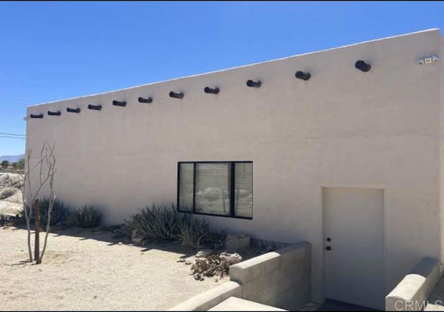 2207 Hoberg Rd, Borrego Springs, CA 92004 - view of home's exterior with stucco siding