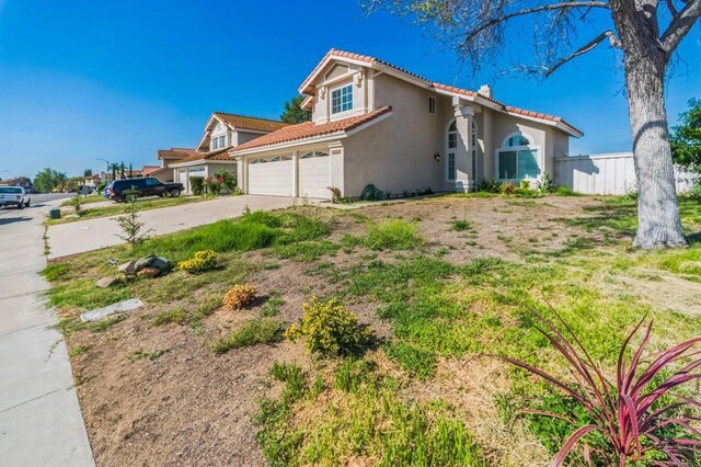 39787 Castile Ave, Murrieta, CA 92562 - view of front of property featuring a tile roof, stucco siding, and concrete driveway