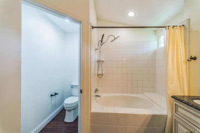 39787 Castile Ave, Murrieta, CA 92562 - bathroom featuring tiled shower / bath, vanity, wood finished floors, and recessed lighting