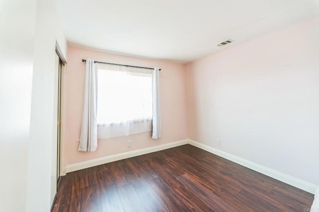 39787 Castile Ave, Murrieta, CA 92562 - empty room with dark wood-style flooring and baseboards