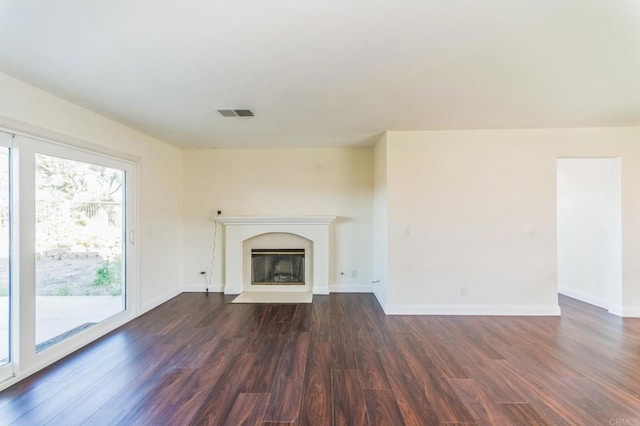 39787 Castile Ave, Murrieta, CA 92562 - unfurnished living room with dark wood finished floors and a fireplace with flush hearth