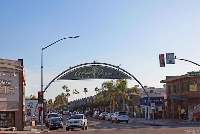 731 Valley Ave, Solana Beach, CA 92075 - view of asphalt road with traffic lights, sidewalks, street lights, curbs, and traffic signs