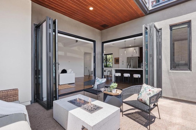 731 Valley Ave, Solana Beach, CA 92075 - view of patio / terrace with an outdoor fire pit