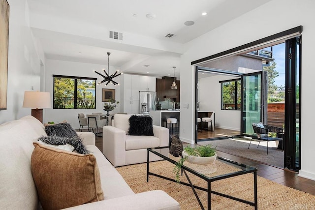 731 Valley Ave, Solana Beach, CA 92075 - living room featuring a chandelier, plenty of natural light, hardwood / wood-style floors, and recessed lighting