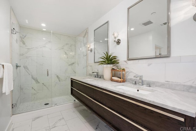 731 Valley Ave, Solana Beach, CA 92075 - full bath with marble finish floors, double vanity, a marble finish shower, and recessed lighting