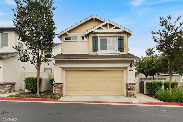 1263 Date Palm Dr, Carson, CA 90746 - craftsman-style home with stone siding, stucco siding, a garage, and roof with shingles