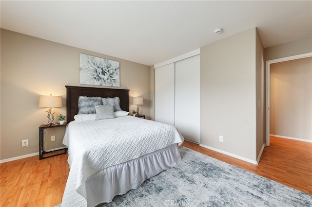 1263 Date Palm Dr, Carson, CA 90746 - bedroom featuring light wood finished floors, a closet, and baseboards