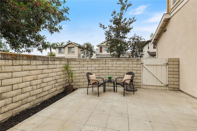 1263 Date Palm Dr, Carson, CA 90746 - fenced backyard with a patio area and a gate