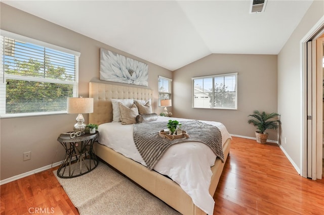 1263 Date Palm Dr, Carson, CA 90746 - bedroom with wood finished floors, baseboards, and vaulted ceiling
