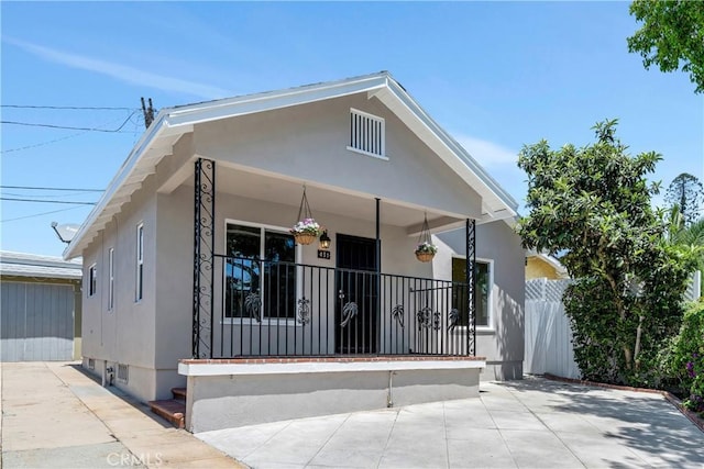 451 N Indiana St, Los Angeles, CA 90063 - view of front facade with covered porch and stucco siding