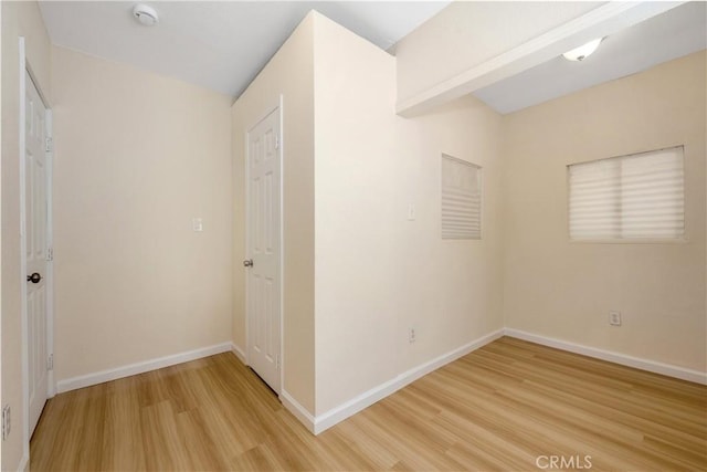 451 N Indiana St, Los Angeles, CA 90063 - unfurnished room featuring light wood-style flooring, a smoke detector, and baseboards