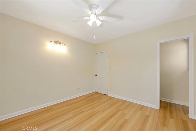 451 N Indiana St, Los Angeles, CA 90063 - unfurnished room featuring light wood-style floors, baseboards, and a ceiling fan
