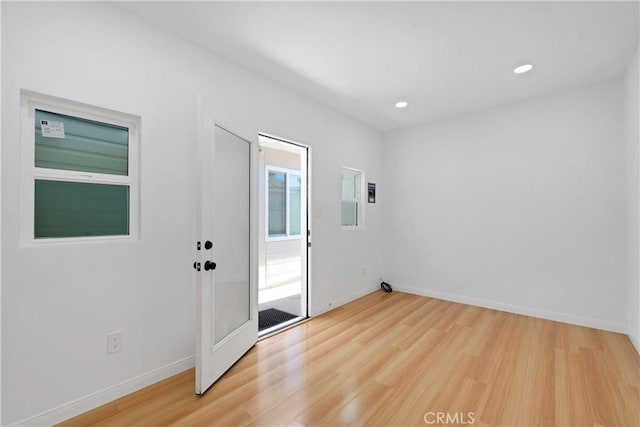 451 N Indiana St, Los Angeles, CA 90063 - spare room with light wood-style flooring, recessed lighting, and baseboards