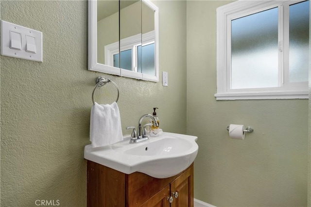 451 N Indiana St, Los Angeles, CA 90063 - bathroom featuring vanity and a textured wall