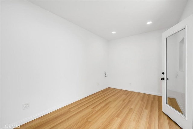 451 N Indiana St, Los Angeles, CA 90063 - empty room with light wood-style floors, recessed lighting, and baseboards