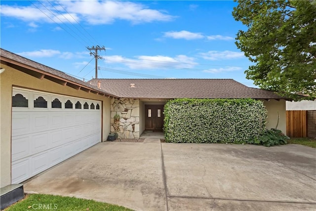 7879 Camino Predera, Rancho Cucamonga, CA 91730 - single story home with driveway, a garage, stone siding, stucco siding, and roof with shingles