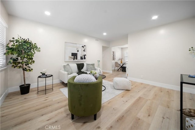 5882 Bowcroft St Unit 2, Los Angeles, CA 90016 - living area with wood finished floors, recessed lighting, and baseboards