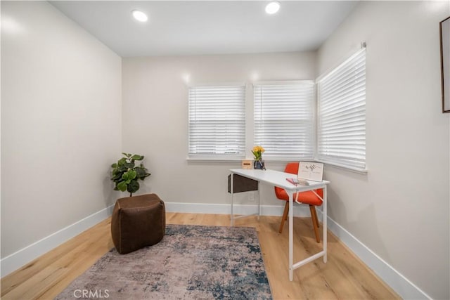 5882 Bowcroft St Unit 2, Los Angeles, CA 90016 - home office with wood finished floors, baseboards, plenty of natural light, and recessed lighting
