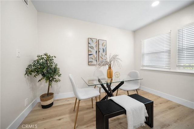5882 Bowcroft St Unit 2, Los Angeles, CA 90016 - dining room with wood finished floors, baseboards, and recessed lighting