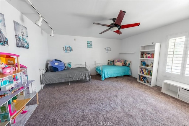 2110 Hathaway Pl, Riverside, CA 92506 - carpeted bedroom featuring a ceiling fan and rail lighting