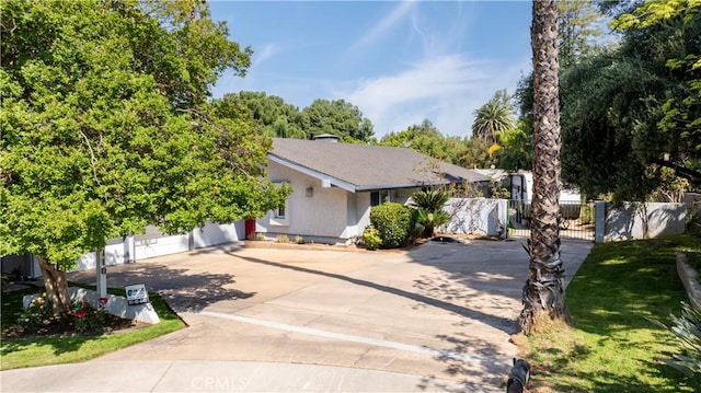 2110 Hathaway Pl, Riverside, CA 92506 - view of front of home featuring a gate and stucco siding