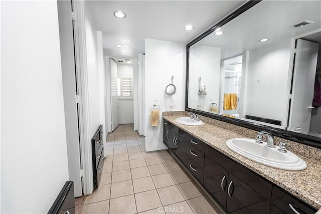 2110 Hathaway Pl, Riverside, CA 92506 - bathroom with double vanity, tile patterned floors, and recessed lighting