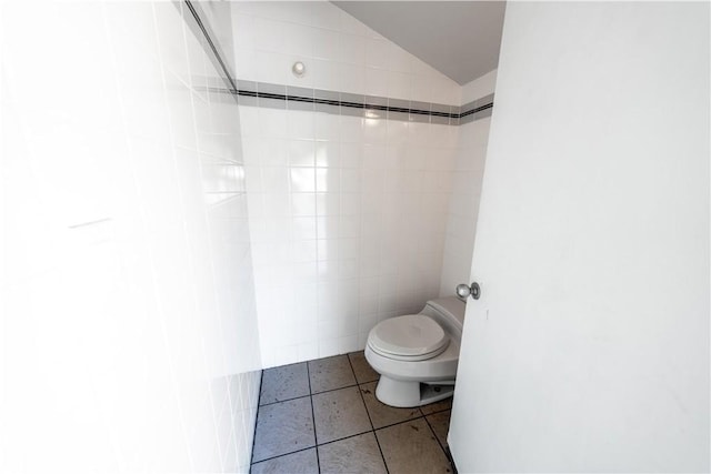 2110 Hathaway Pl, Riverside, CA 92506 - bathroom featuring toilet, tile patterned flooring, and lofted ceiling