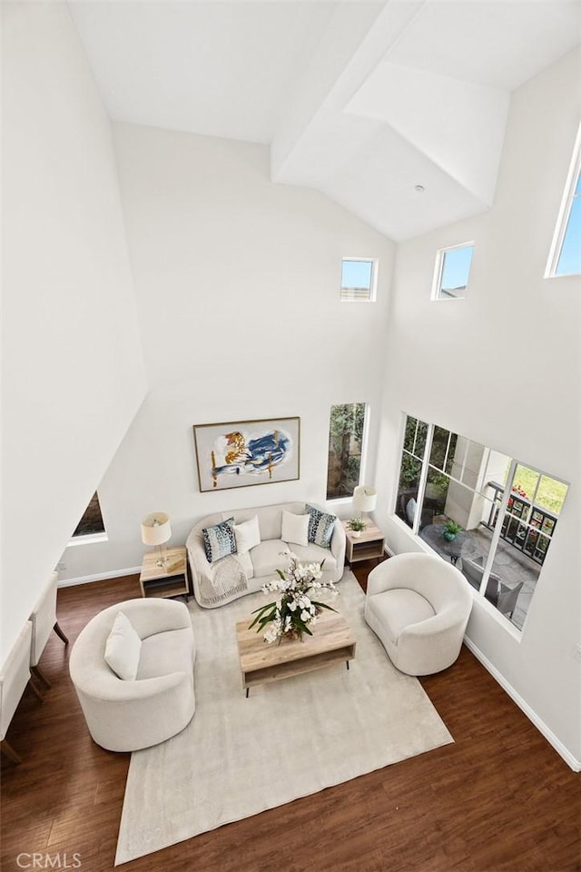 3612 Skylark Way, Brea, CA 92823 - living area with wood finished floors, high vaulted ceiling, baseboards, and beamed ceiling