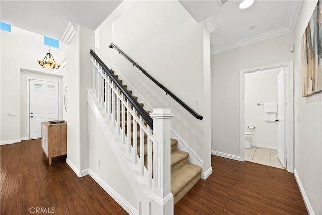 3612 Skylark Way, Brea, CA 92823 - stairs with a chandelier, wood finished floors, crown molding, and baseboards