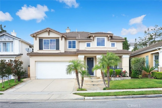 3612 Skylark Way, Brea, CA 92823 - view of front of house featuring driveway, an attached garage, stucco siding, a front lawn, and a chimney