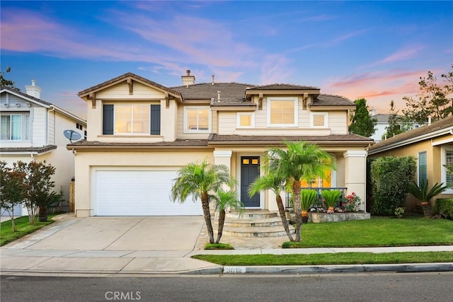 3612 Skylark Way, Brea, CA 92823 - view of front of home with a garage, concrete driveway, a front yard, stucco siding, and a chimney