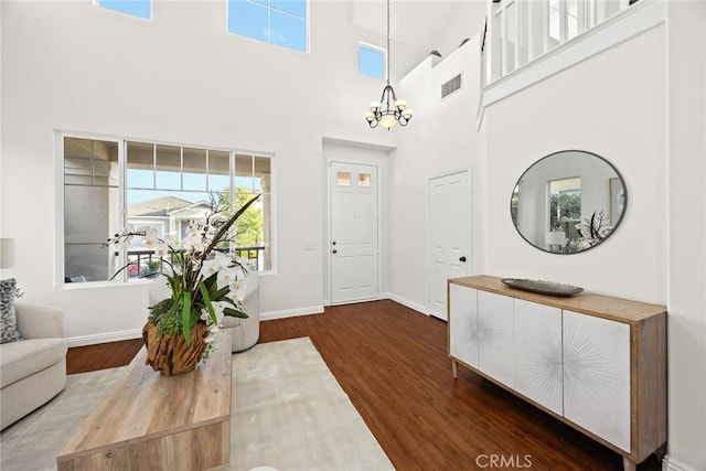 3612 Skylark Way, Brea, CA 92823 - entrance foyer with a chandelier, plenty of natural light, a towering ceiling, wood finished floors, and baseboards