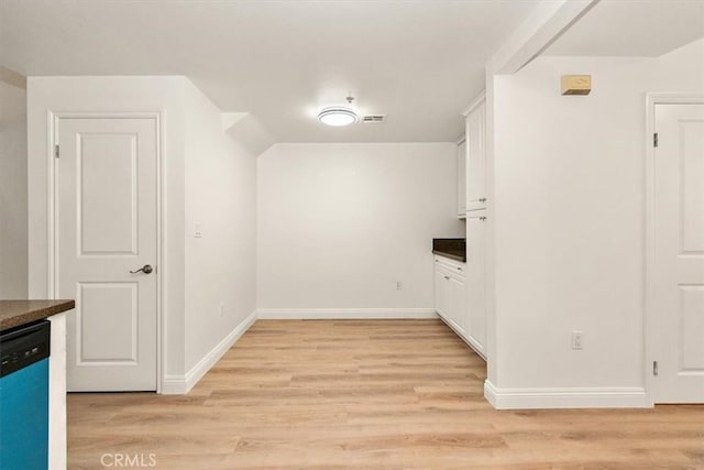 89 E Commonwealth Ave Unit 1I, Alhambra, CA 91801 - interior space with dark countertops, dishwasher, white cabinetry, and light wood-style floors