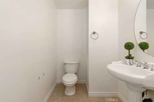 89 E Commonwealth Ave Unit 1I, Alhambra, CA 91801 - half bathroom with tile patterned floors, toilet, and baseboards