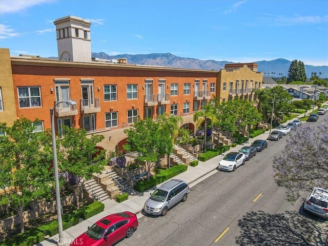 89 E Commonwealth Ave Unit 1I, Alhambra, CA 91801 - view of building exterior with a mountain view and stairway