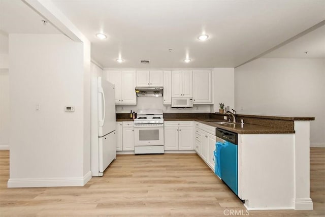 89 E Commonwealth Ave Unit 1I, Alhambra, CA 91801 - kitchen featuring white appliances, a sink, light wood-type flooring, dark countertops, and recessed lighting