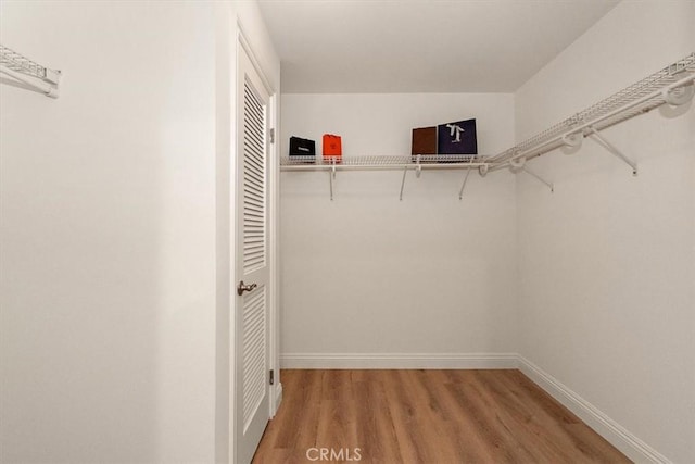 89 E Commonwealth Ave Unit 1I, Alhambra, CA 91801 - spacious closet with light wood-style floors